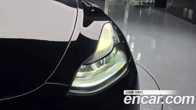 Tesla Model Y — Фото автомобиля 6