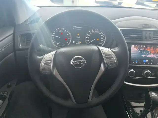 Nissan Tiida — Фото автомобиля 6