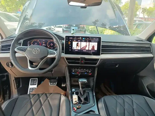 Volkswagen Tiguan L — Фото автомобиля 9