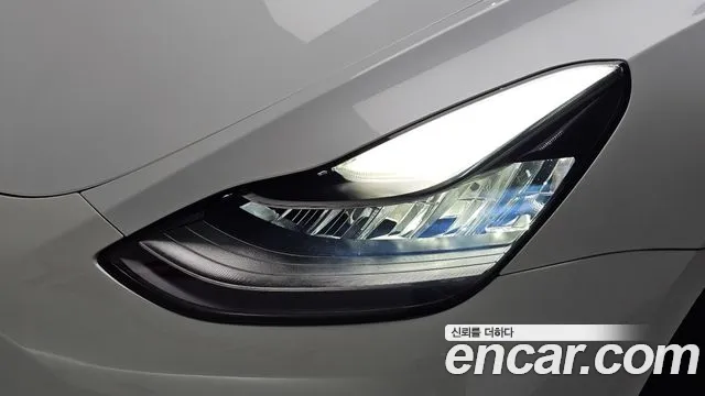 Tesla Model Y — Фото автомобиля 7