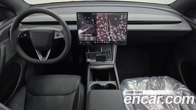 Tesla Model Y — Фото автомобиля 7