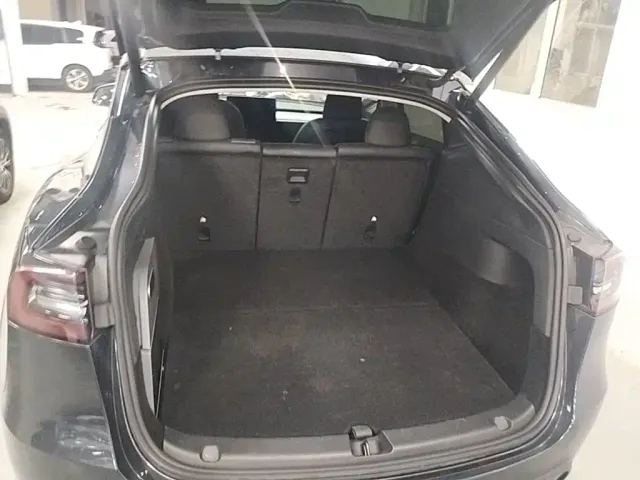 Tesla Model Y — Фото автомобиля 18