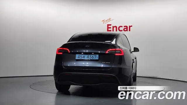 Tesla Model Y — Фото автомобиля 4