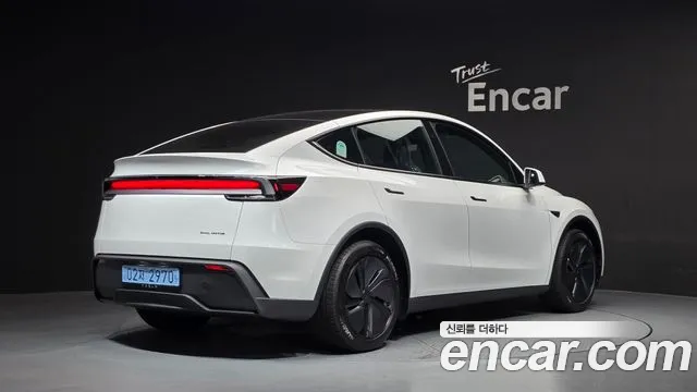 Tesla Model Y — Фото автомобиля 2