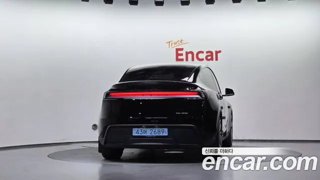 Tesla Model Y — Фото автомобиля 4