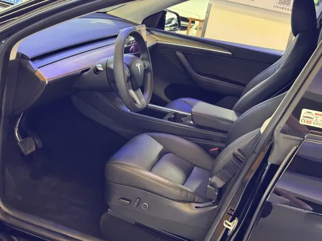 Tesla Model Y — Фото автомобиля 14