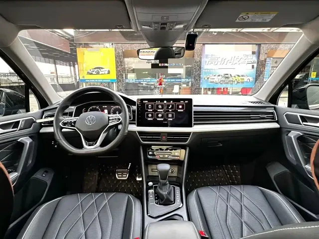 Volkswagen Tiguan L — Фото автомобиля 4