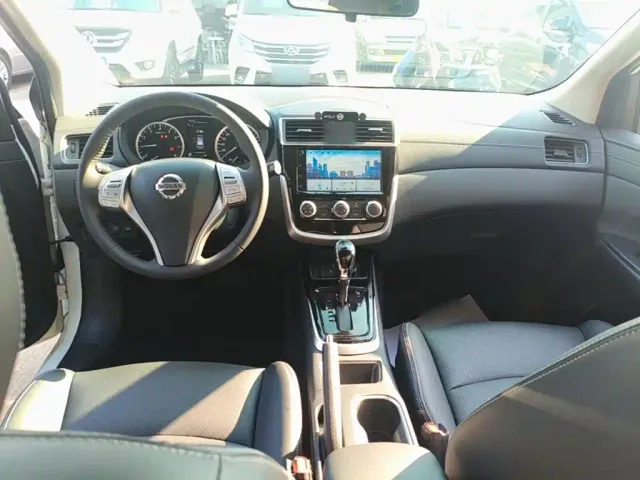 Nissan Tiida — Фото автомобиля 9