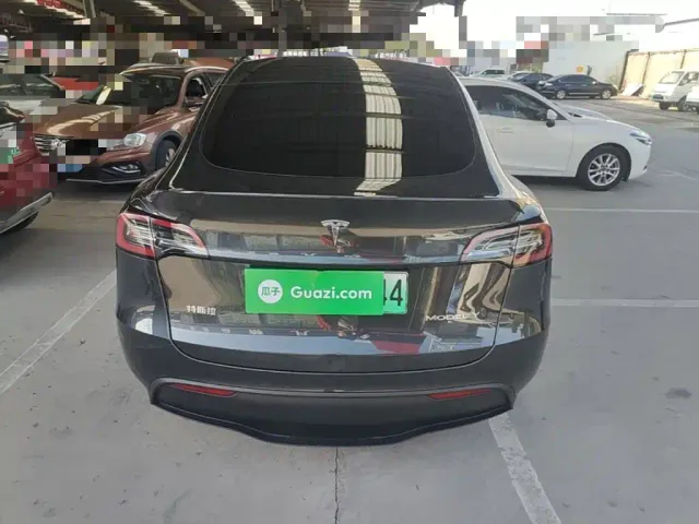 Tesla Model Y — Фото автомобиля 5