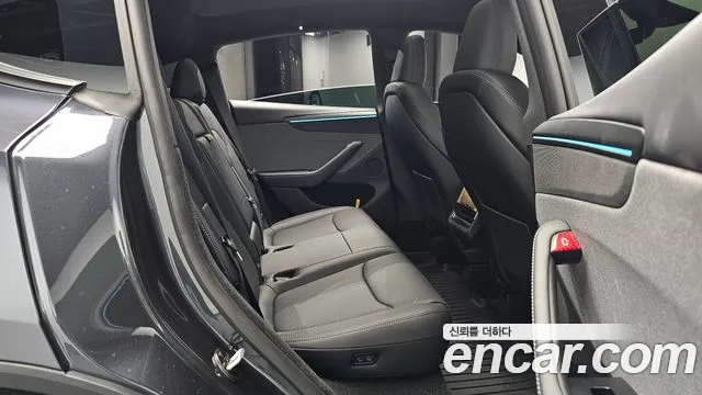Tesla Model Y — Фото автомобиля 10