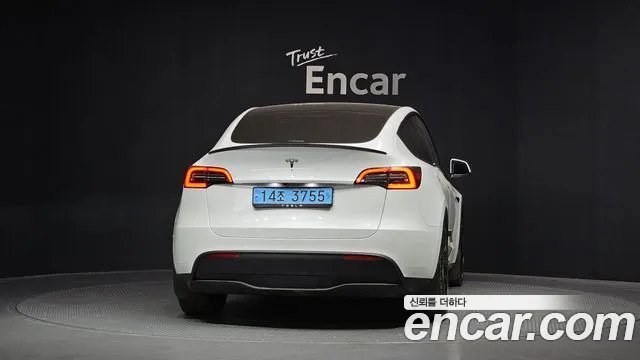 Tesla Model Y — Фото автомобиля 4
