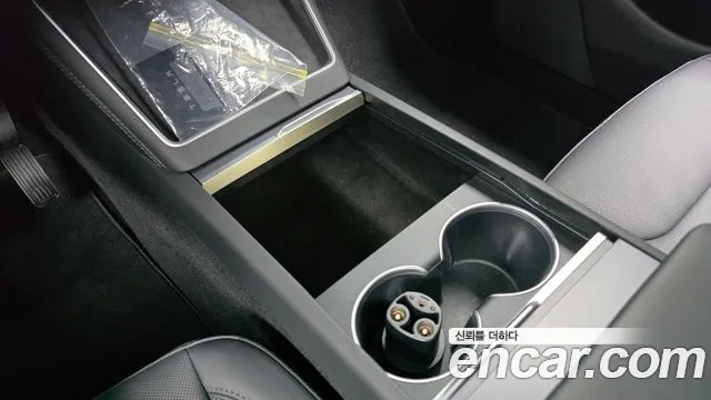 Tesla Model Y — Фото автомобиля 11