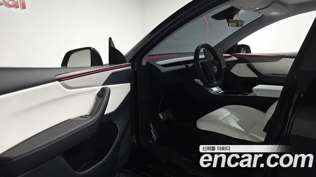 Tesla Model Y — Фото автомобиля 15