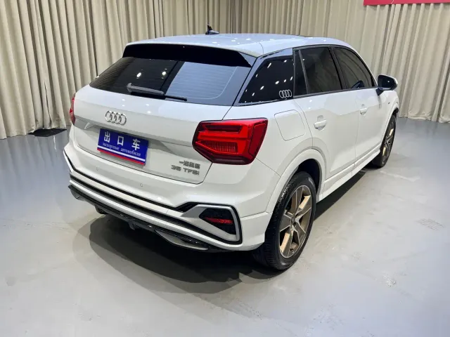 Audi Q2L — Фото автомобиля 6