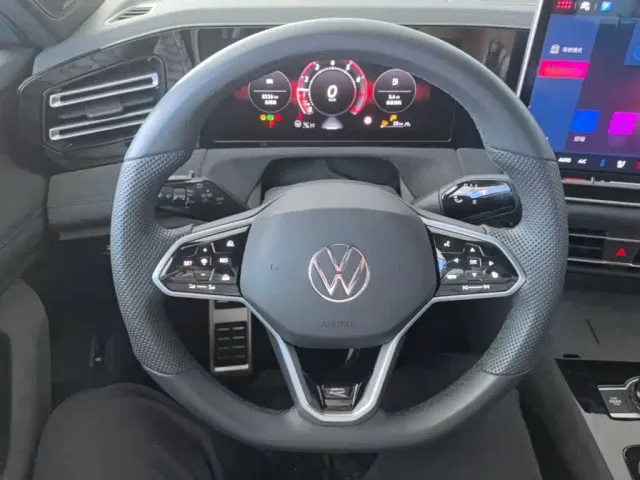 Volkswagen Tiguan L — Фото автомобиля 10