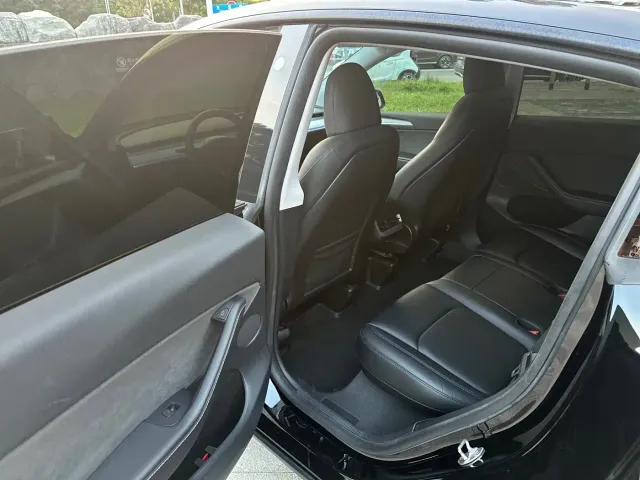 Tesla Model Y — Фото автомобиля 14