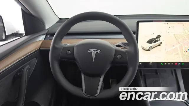 Tesla Model Y — Фото автомобиля 18