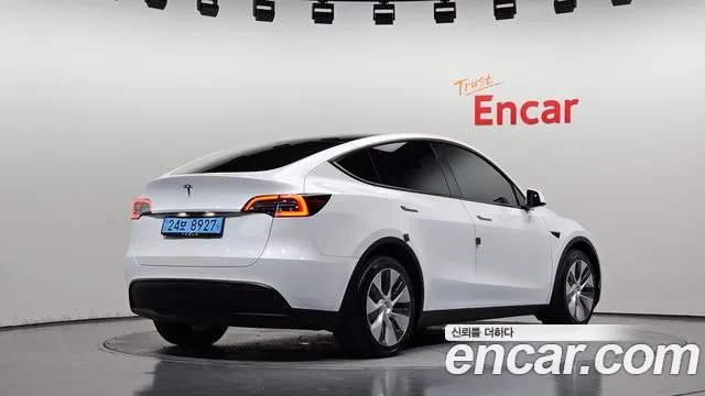 Tesla Model Y — Фото автомобиля 2