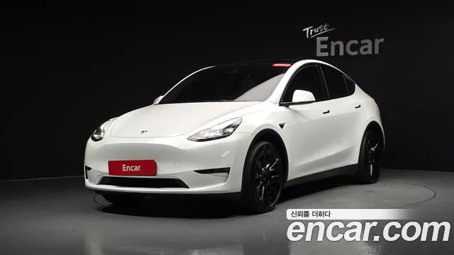 Tesla Model Y — Фото автомобиля 8