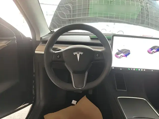 Tesla Model Y — Фото автомобиля 10