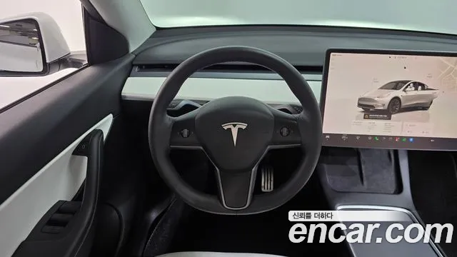 Tesla Model Y — Фото автомобиля 19