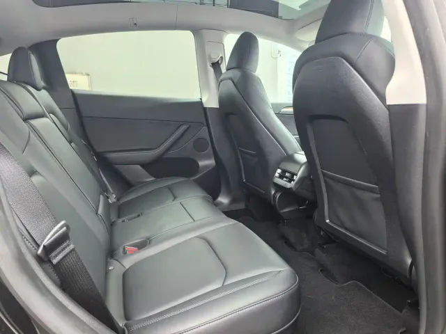 Tesla Model Y — Фото автомобиля 9