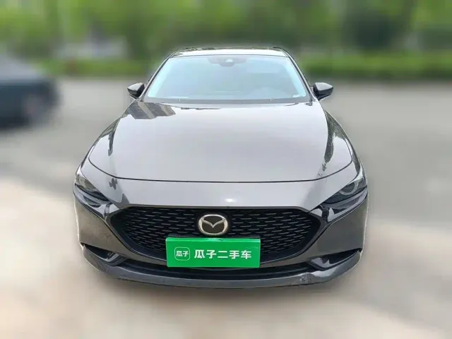 Mazda Axela — Фото автомобиля 23