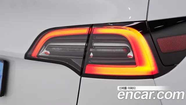 Tesla Model Y — Фото автомобиля 7
