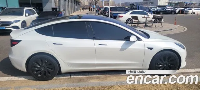 Tesla Model 3 — Фото автомобиля 4