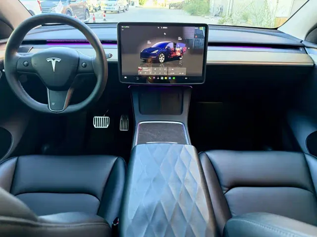 Tesla Model Y — Фото автомобиля 7