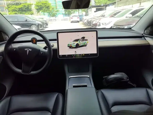 Tesla Model Y — Фото автомобиля 9