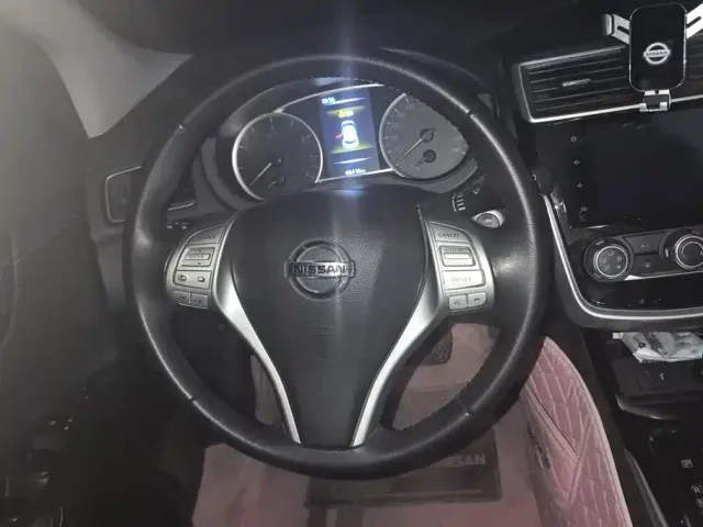 Nissan Tiida — Фото автомобиля 15
