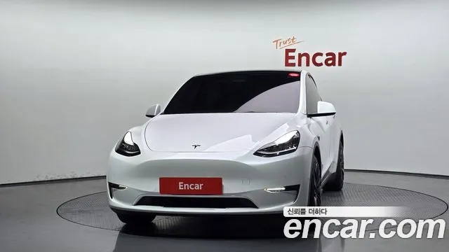 Tesla Model Y — Фото автомобиля 3