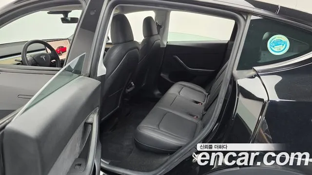 Tesla Model Y — Фото автомобиля 11