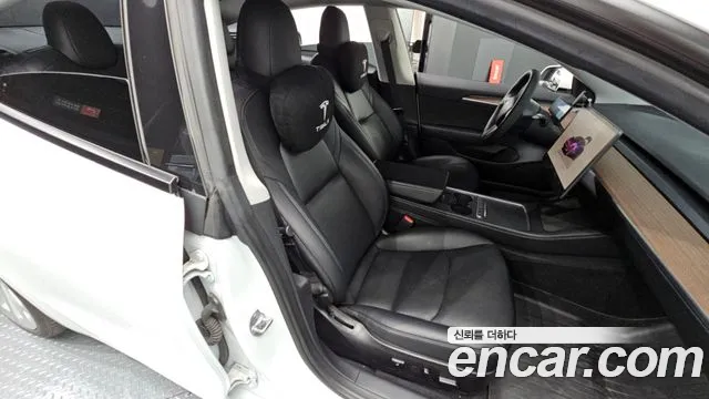 Tesla Model 3 — Фото автомобиля 27