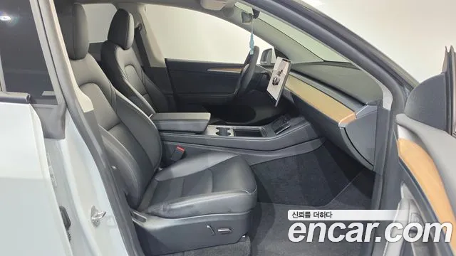 Tesla Model Y — Фото автомобиля 15