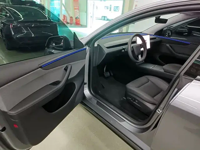 Tesla Model Y — Фото автомобиля 15