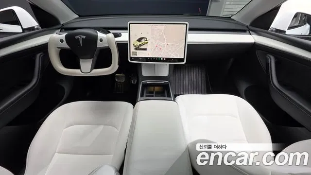 Tesla Model Y — Фото автомобиля 10