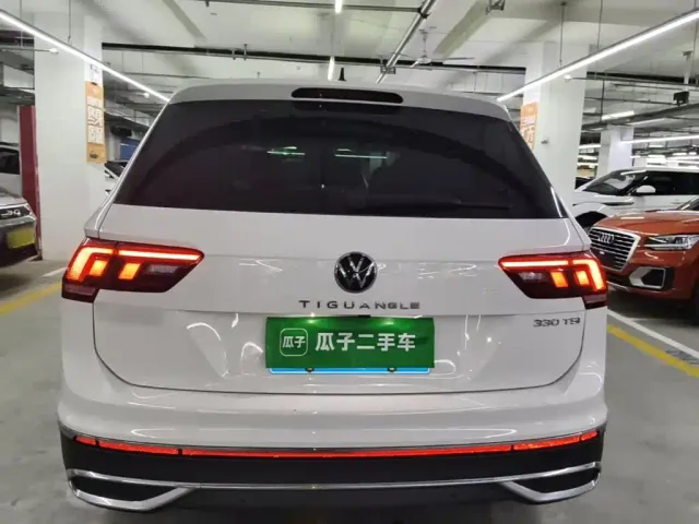 Volkswagen Tiguan L — Фото автомобиля 5