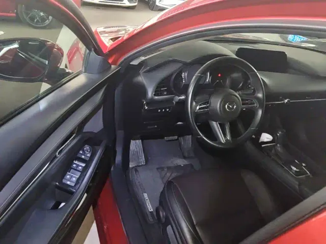 Mazda Axela — Фото автомобиля 15