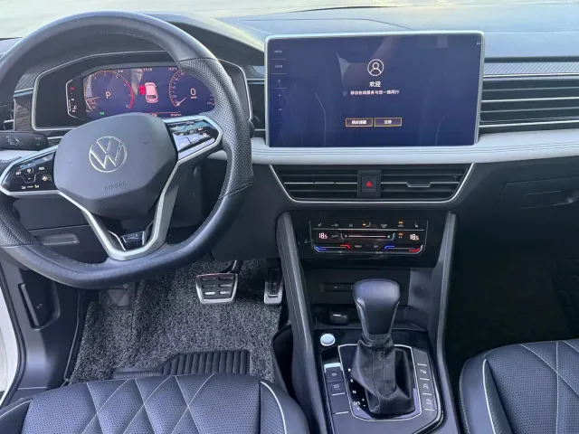 Volkswagen Tiguan L — Фото автомобиля 10