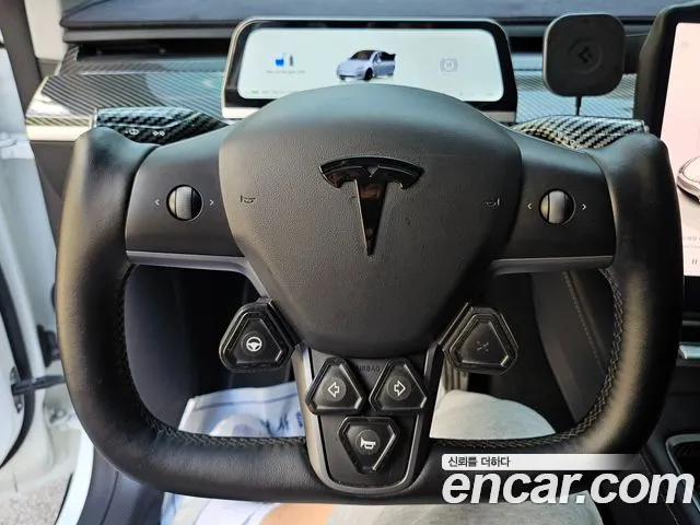 Tesla Model Y — Фото автомобиля 14