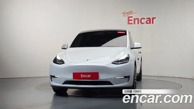 Tesla Model Y — Фото автомобиля 3