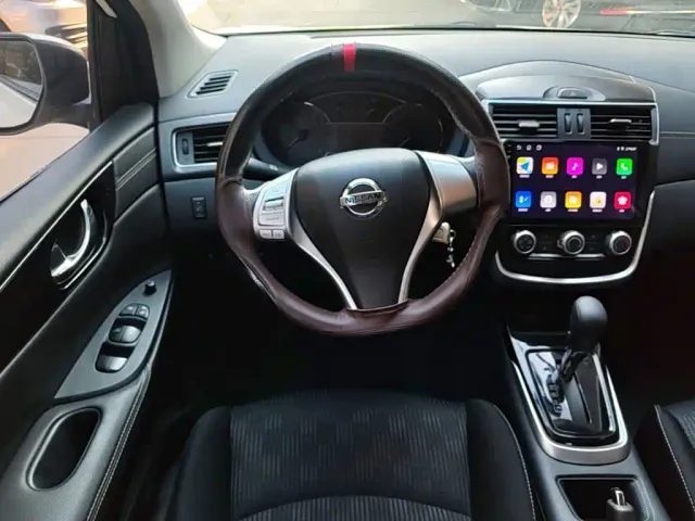 Nissan Tiida — Фото автомобиля 10