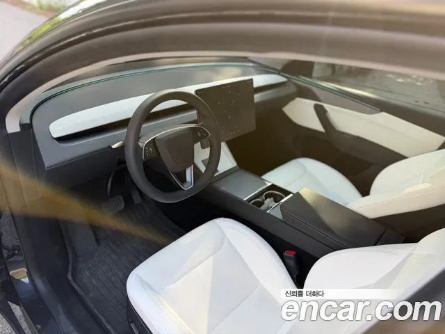 Tesla Model Y — Фото автомобиля 10
