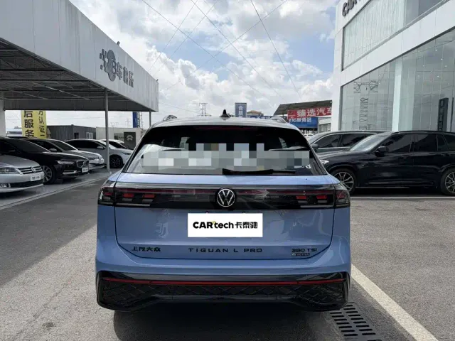 Volkswagen Tiguan L — Фото автомобиля 11