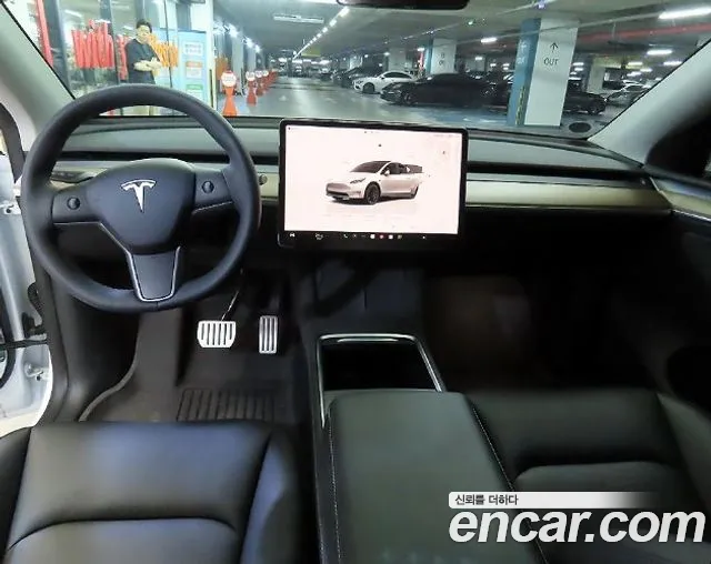Tesla Model Y — Фото автомобиля 9