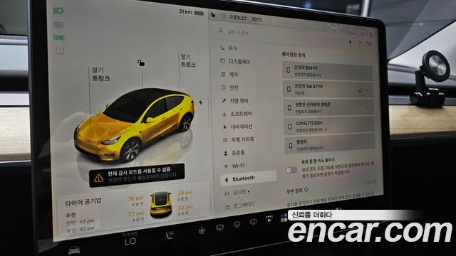 Tesla Model Y — Фото автомобиля 27
