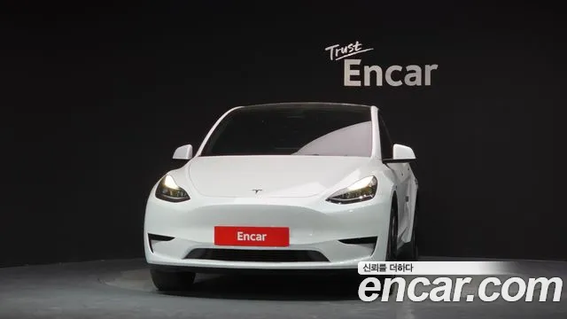 Tesla Model Y — Фото автомобиля 3