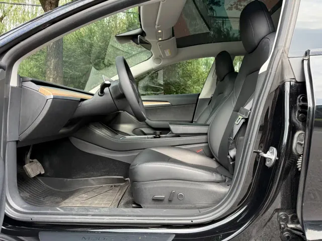 Tesla Model 3 — Фото автомобиля 11
